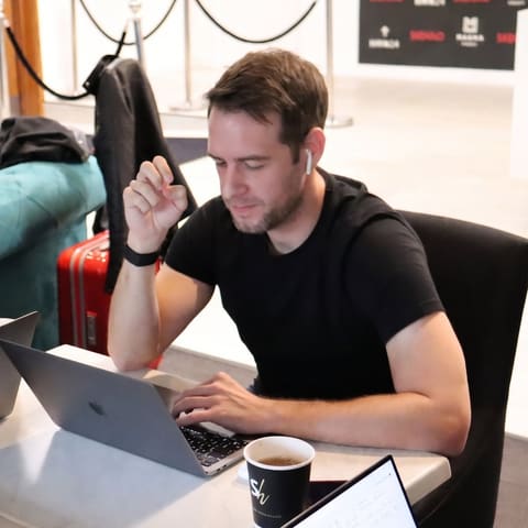 Me working at a laptop during my White Label Loyalty years
